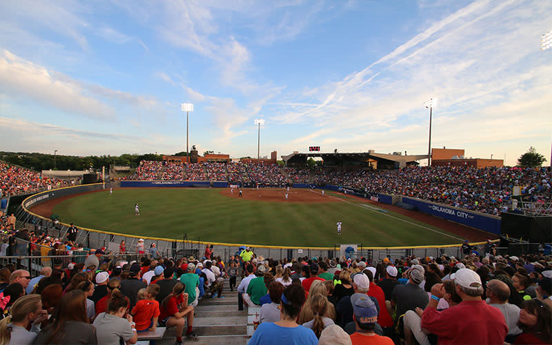 Oklahoma City Softball Stadium and an Introduction to Softball Positions and Skills The image depicting the Oklahoma City Softball Stadium and the people watching sports