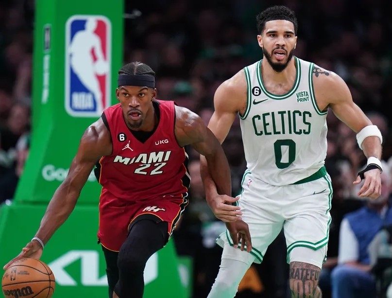 Miami and Celtics in action during a match Heat Rout Celtics: