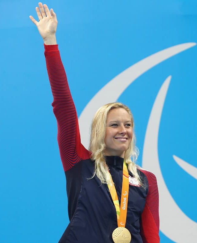 Iong Jessica od USA waiving to the crowd after her medal win The Resilient Journey of the USA's Paralympic Medal Triumphs